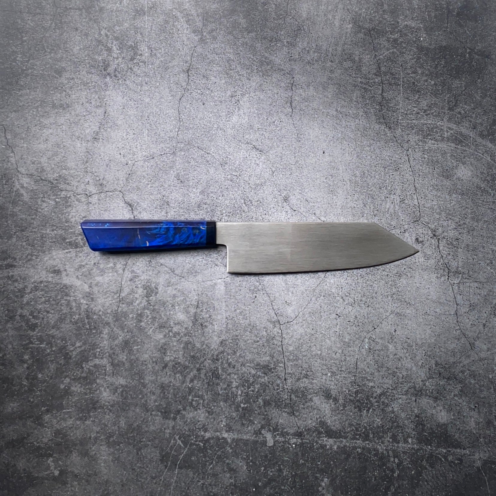 180mm Bunka. Sandvik 14c28n Stainless. Blue Stabilized Dyed Maple. Pakka Ferrule