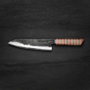 180mm Kurouchi Santoku with Skateboard Handle and Ox Horn Ferrule made by Nacionale Bladeworks.